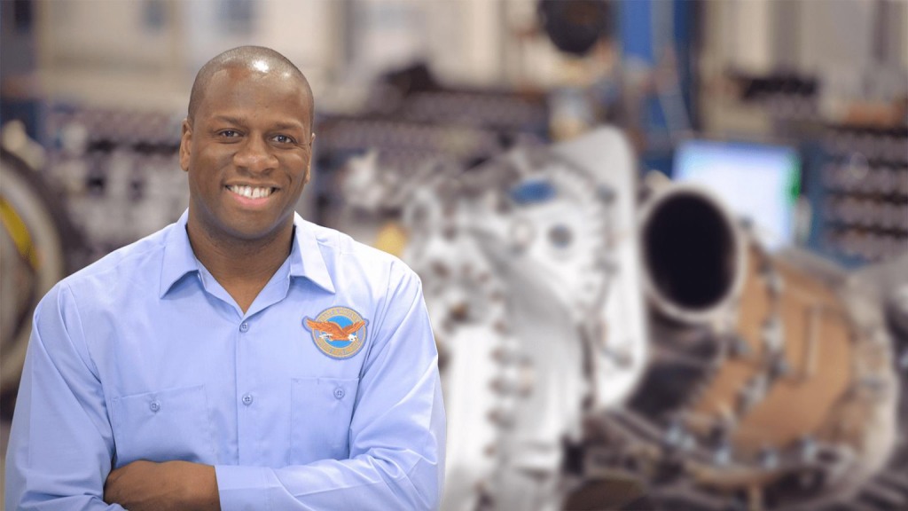 pratt and whitney gentleman in purple shirt
